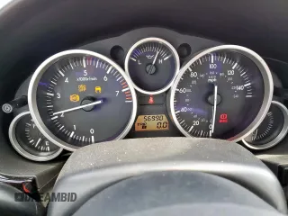2008 Mazda MX-5 Miata Grand Touring z VIN JM1NC26F180144365, wystawiony jako Copart lot #58216365 z przebiegiem 56 990 mil mil oraz Szkoda całkowita • Salvage title. Historia ofert i sprzedaży dostępna na DreamBid. Obrazek 9.