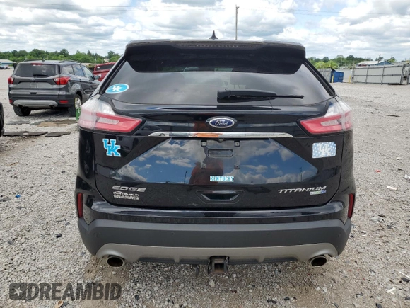 2019 Ford Edge Titanium with VIN 2FMPK4K94KBB35538, listed as a Copart auction lot 57770545 with 85,021 mi miles and Salvage title. Bid and sale history available at DreamBid. Image 6.