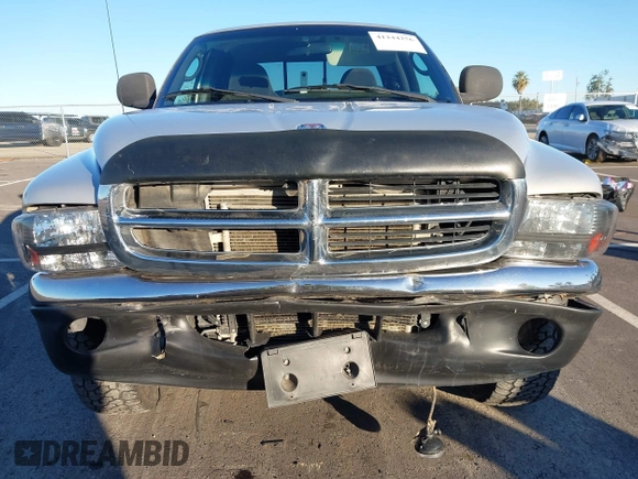 2000 Dodge Dakota Sport with VIN 1B7GG22N6YS690223, listed as a IAAI auction lot 41244256 with 147,443 mi miles. Bid and sale history available at carsss.com. Image 6.