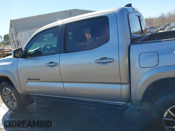 2023 Toyota Tacoma 4WD SR with VIN 3TYCZ5AN7PT122067, listed as a IAAI auction lot 41624047 with 27,483 mi miles. Bid and sale history available at carsss.com. Image 14.