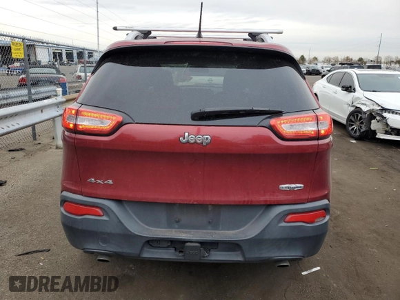 2014 Jeep Cherokee Altitude with VIN 1C4PJMCSXEW124863, listed as a Copart auction lot 82432534 with 194,559 mi miles and Salvage Title. Bid and sale history available at carsss.com. Image 6.
