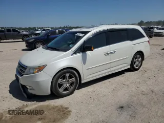 2013 Honda Odyssey Touring with VIN 5FNRL5H94DB021388, listed as a Copart auction lot 52582775 with 141,566 mi miles and Salvage Title. Bid and sale history available at carsss.com. Image 1.
