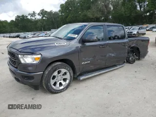 2023 Ram 1500 Big Horn with VIN 1C6SRFFT5PN700801, listed as a Copart auction lot 54902065 with 19,014 mi miles and Salvage title. Bid and sale history available at DreamBid. Image 1.