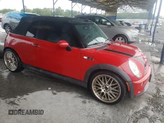 2005 MINI Convertible S с VIN WMWRH334X5TF82551, выставлен на аукционе Copart как лот 57983355 с пробегом 73 885 миль миль и Списание • Salvage title. История ставок и продаж доступна на DreamBid. Изображение 4.