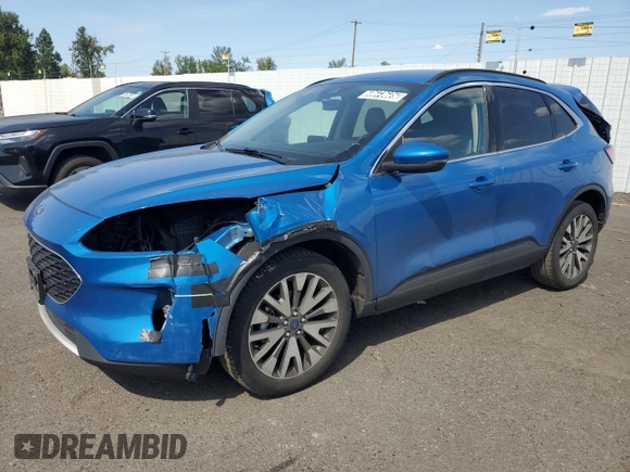 2020 Ford Escape Titanium z VIN 1FMCU9J90LUB15564, wystawiony jako Copart lot #59673625 z przebiegiem 84 474 mil mil oraz Czysty tytuł • Clean title. Historia ofert i sprzedaży dostępna na DreamBid. Obrazek 1.