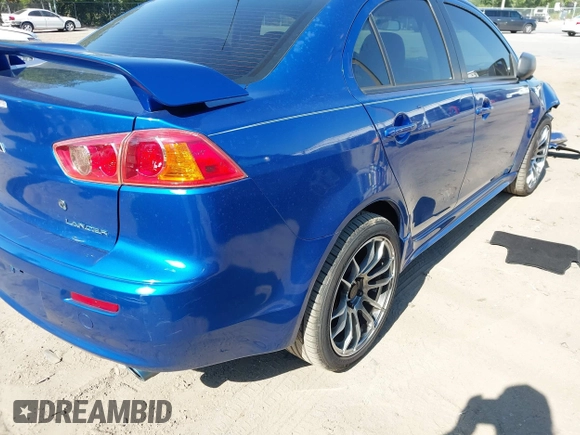 2009 Mitsubishi Lancer with VIN JA3AU86W79U039708, listed as a IAAI auction lot 42065100 with 71,763 mi miles and . Bid and sale history available at DreamBid. Image 4.