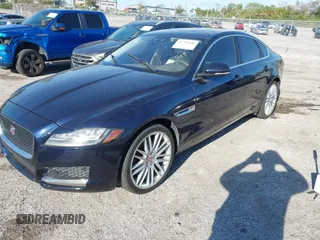 2016 Jaguar XF 35t Prestige with VIN SAJBE4BVXGCY15956, listed as a IAAI auction lot 41719846 with 111,348 mi miles. Bid and sale history available at carsss.com. Image 2.