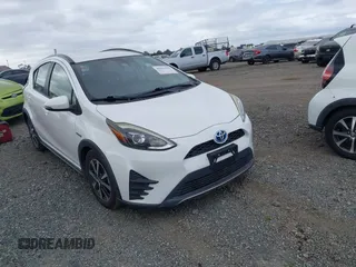 2018 Toyota Prius One with VIN JTDKDTB35J1615449, listed as a IAAI auction lot 42041928 with 59,870 mi miles and . Bid and sale history available at DreamBid. Image 6.