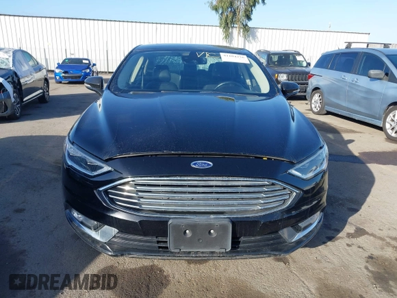 2017 Ford Fusion Energi SE with VIN 3FA6P0PU0HR129792, listed as a IAAI auction lot 41104376 with 86,659 mi miles. Bid and sale history available at carsss.com. Image 12.
