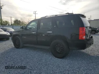 2009 GMC Yukon SLT w/4SA with VIN 1GKEC33369R270660, listed as a Copart auction lot 87280724 with 167,034 mi miles and Clean Title. Bid and sale history available at carsss.com. Image 2.