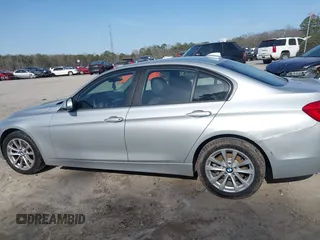 2018 BMW 3 Series 320i with VIN WBA8A9C55JAH14990, listed as a IAAI auction lot 41719896 with 77,472 mi miles. Bid and sale history available at carsss.com. Image 14.