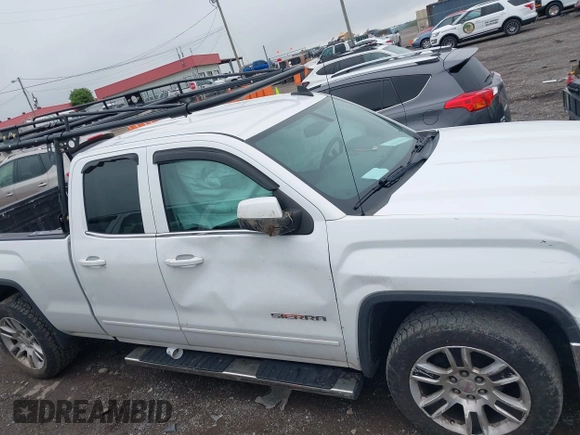 2015 GMC Sierra 1500 SLE z VIN 1GTR1UEH0FZ358519, wystawiony jako IAAI lot #42212768 z przebiegiem 144 324 mil mil oraz . Historia ofert i sprzedaży dostępna na DreamBid. Obrazek 13.