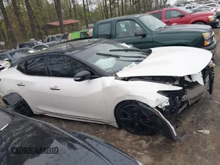 2017 Nissan Maxima Platinum with VIN 1N4AA6AP2HC412534, listed as a IAAI auction lot 41910678 with 140,675 mi miles and . Bid and sale history available at DreamBid. Image 13.