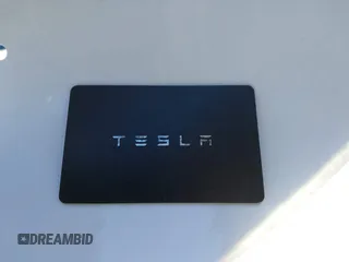 2024 Tesla Model Y Long Range with VIN 7SAYGDEEXRF983040, listed as a IAAI auction lot 41555332 with 79,506 mi miles and . Bid and sale history available at DreamBid. Image 11.