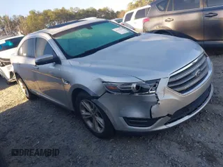 2015 Ford Taurus SEL with VIN 1FAHP2E84FG189640, listed as a IAAI auction lot 41814795 with 100,209 mi miles and . Bid and sale history available at carsss.com. Image 1.