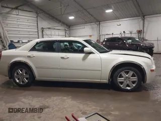 2006 Chrysler 300 Touring with VIN 2C3LK53G76H518015, listed as a IAAI auction lot 41440502 with 117,789 mi miles. Bid and sale history available at carsss.com. Image 13.