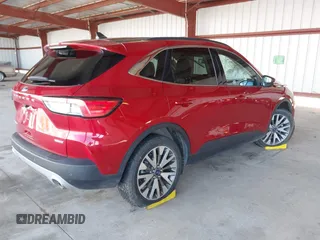 2020 Ford Escape Titanium Hybrid z VIN 1FMCU9DZ1LUC19346, wystawiony jako IAAI lot #41597142 z przebiegiem 75 945 mil mil oraz . Historia ofert i sprzedaży dostępna na DreamBid. Obrazek 4.