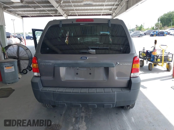 2005 Ford Escape Hybrid with VIN 1FMCU95HX5KD54412, listed as a IAAI auction lot 42115468 with 151,922 mi miles and . Bid and sale history available at DreamBid. Image 16.