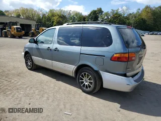 2000 Toyota Sienna LE with VIN 4T3ZF13C2YU286474, listed as a Copart auction lot 74230384 with 118,988 mi miles and Salvage Title. Bid and sale history available at carsss.com. Image 2.