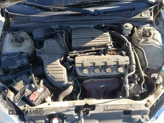 2004 Honda Civic LX with VIN 2HGES16574H586644, listed as a IAAI auction lot 40991883 with 199,336 mi miles. Bid and sale history available at carsss.com. Image 10.