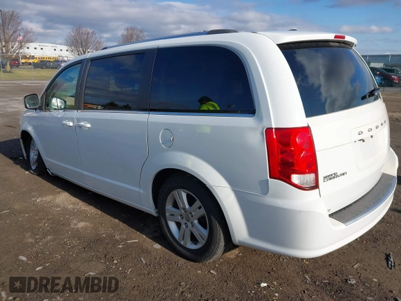 2019 Dodge Grand Caravan SXT with VIN 2C4RDGCG4KR771745, listed as a IAAI auction lot 41859267 with 97,436 mi miles and . Bid and sale history available at DreamBid. Image 3.