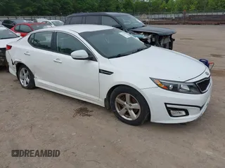 2015 Kia Optima LX z VIN KNAGM4A78F5653027, wystawiony jako IAAI lot #42203490 z przebiegiem 112 355 mil mil oraz . Historia ofert i sprzedaży dostępna na DreamBid. Obrazek 1.