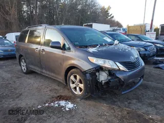 2015 Toyota Sienna LE AAS with VIN 5TDKK3DC2FS678943, listed as a IAAI auction lot 41184022 with 161,120 mi miles. Bid and sale history available at carsss.com. Image 1.