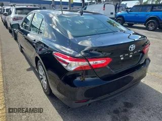 2019 Toyota Camry Hybrid LE z VIN 4T1B31HK0KU511923, wystawiony jako IAAI lot #42566419 z przebiegiem 67 166 mil mil oraz . Historia ofert i sprzedaży dostępna na DreamBid. Obrazek 26.