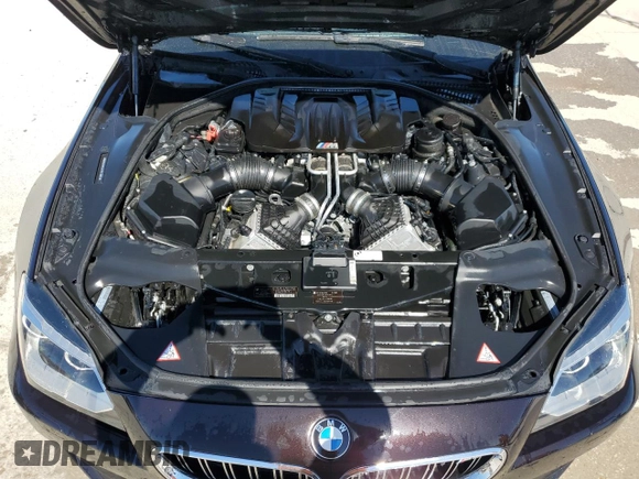 2014 BMW M6 z VIN WBS6C9C51EDV73883, wystawiony jako Copart lot #76395574 z przebiegiem 57 995 mil mil oraz Czysty tytuł • Clean title. Historia ofert i sprzedaży dostępna na DreamBid. Obrazek 11.
