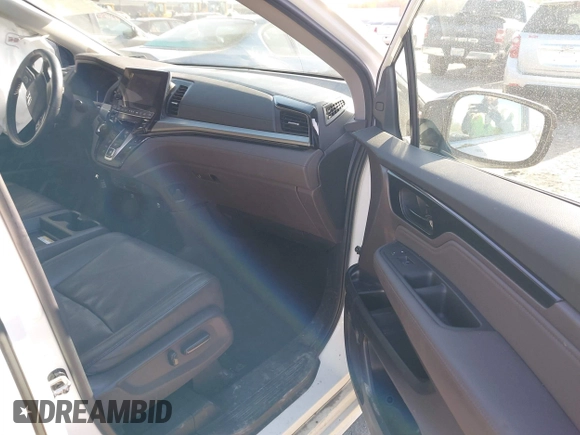 2020 Honda Odyssey Elite with VIN 5FNRL6H92LB014671, listed as a IAAI auction lot 42110389 with 104,180 mi miles and . Bid and sale history available at DreamBid. Image 5.