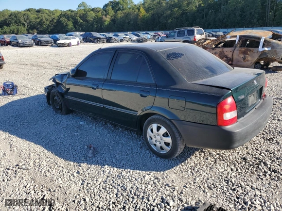 1999 Mazda Protege DX with VIN JM1BJ2222X0126273, listed as a Copart auction lot 75479364 with 293,952 mi miles and Salvage Title. Bid and sale history available at carsss.com. Image 2.
