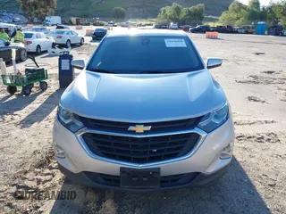 2020 Chevrolet Equinox LT with VIN 2GNAXUEV7L6111580, listed as a IAAI auction lot 41830060 with 96,968 mi miles and . Bid and sale history available at DreamBid. Image 12.