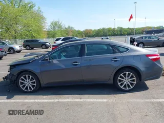 2013 Toyota Avalon XLE with VIN 4T1BK1EB2DU005939, listed as a IAAI auction lot 42172970 with 248,580 mi miles and . Bid and sale history available at DreamBid. Image 14.