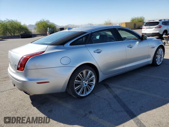 2015 Jaguar XJ with VIN SAJWA2GZ4F8V90853, listed as a Copart auction lot 72631114 with 59,237 mi miles and Salvage Title. Bid and sale history available at carsss.com. Image 3.