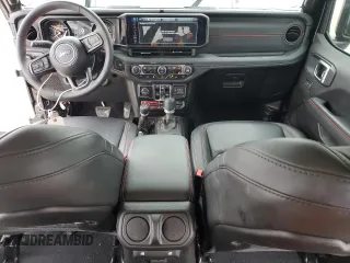 2024 Jeep Wrangler Rubicon X with VIN 1C4RJXFG1RW137055, listed as a Copart auction lot 43633625 with 7,686 mi miles and Clean title. Bid and sale history available at DreamBid. Image 8.