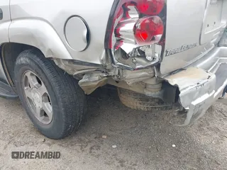 2004 Chevrolet TrailBlazer LS with VIN 1GNDT13S842159121, listed as a IAAI auction lot 42206485 with 156,432 mi miles and . Bid and sale history available at DreamBid. Image 6.