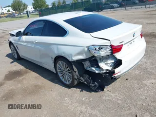 2015 BMW 4 Series 428i xDrive with VIN WBA3N5C52FK484864, listed as a IAAI auction lot 42569077 with 95,431 mi miles and . Bid and sale history available at DreamBid. Image 3.