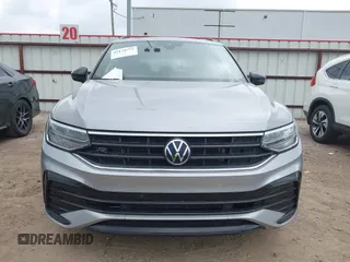 2022 Volkswagen Tiguan SE R-Line Black with VIN 3VVCB7AXXNM165748, listed as a IAAI auction lot 42178772 with 64,007 mi miles and . Bid and sale history available at DreamBid. Image 12.