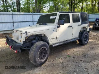 2011 Jeep Wrangler Unlimited Sport z VIN 1J4BA3H13BL592428, wystawiony jako Copart lot #52737075 z przebiegiem 246 737 mil mil oraz Szkoda całkowita • Salvage title. Historia ofert i sprzedaży dostępna na DreamBid. Obrazek 1.
