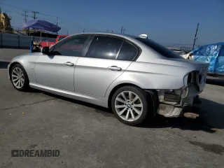 2011 BMW 3 Series 328i with VIN WBAPH5C56BA442027, listed as a Copart auction lot 62583355 with 154,066 mi miles and Salvage title. Bid and sale history available at DreamBid. Image 2.