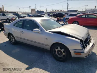 1999 Mercedes-Benz CLK-Class with VIN WDBLJ65G9XF065356, listed as a Copart auction lot 73586424 with 228,410 mi miles and Salvage Title. Bid and sale history available at carsss.com. Image 4.