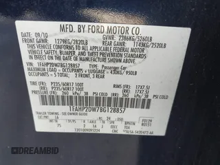 2011 Ford Taurus SE with VIN 1FAHP2DW7BG128857, listed as a IAAI auction lot 41705643 with 163,589 mi miles. Bid and sale history available at carsss.com. Image 9.