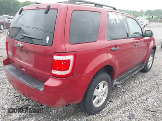 2011 Ford Escape XLT with VIN 1FMCU0D70BKB19310, listed as a IAAI auction lot 42100801 with 211,028 mi miles. Bid and sale history available at carsss.com. Image 4.