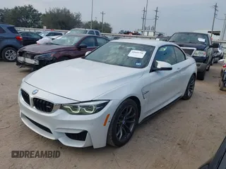 2018 BMW M4 with VIN WBS4Z9C55JED30963, listed as a IAAI auction lot 41641751 with 34,543 mi miles and . Bid and sale history available at DreamBid. Image 2.