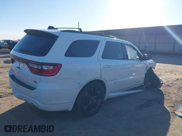 2023 Dodge Durango R/T Plus with VIN 1C4SDHCT5PC589797, listed as a IAAI auction lot 41472148 with 34,980 mi miles and . Bid and sale history available at DreamBid. Image 4.