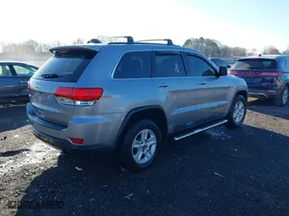2017 Jeep Grand Cherokee Laredo with VIN 1C4RJEAG3HC890386, listed as a IAAI auction lot 41790836 with 67,166 mi miles. Bid and sale history available at carsss.com. Image 4.