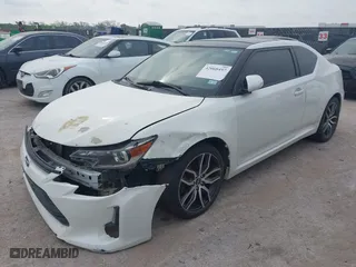 2016 Scion tC with VIN JTKJF5C75GJ016412, listed as a IAAI auction lot 42068497 with 1 mi miles. Bid and sale history available at carsss.com. Image 2.