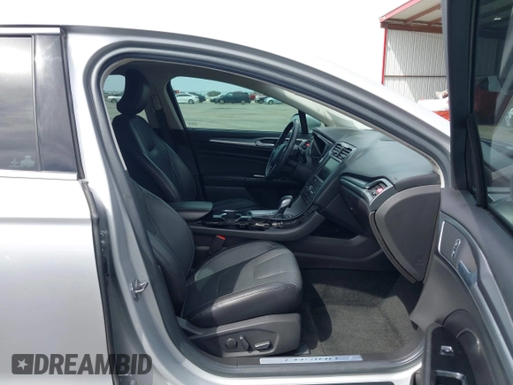 2016 Ford Fusion Titanium with VIN 3FA6P0K90GR132709, listed as a IAAI auction lot 41790873 with 63,269 mi miles and . Bid and sale history available at carsss.com. Image 5.