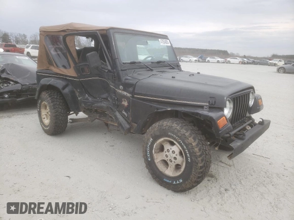 2002 Jeep Wrangler Sahara with VIN 1J4FA59S42P720513, listed as a Copart auction lot 47054805 with 190,922 mi miles and Salvage title. Bid and sale history available at DreamBid. Image 4.
