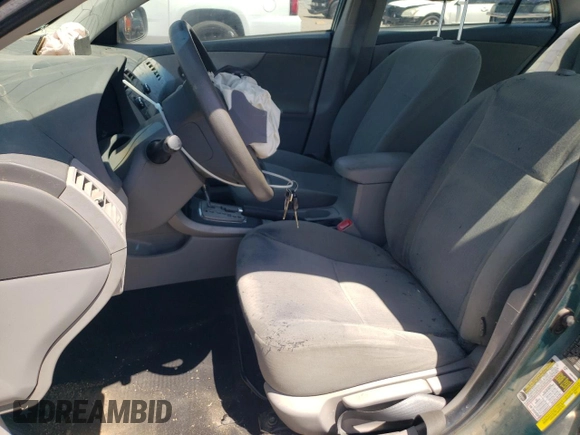 2010 Toyota Corolla with VIN 2T1BU4EE8AC358186, listed as a Copart auction lot 60699135 with 158,972 mi miles and Salvage title. Bid and sale history available at DreamBid. Image 7.